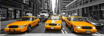 Vliesová fototapeta Taxi ve městě 375 x 150 cm panoramatická 